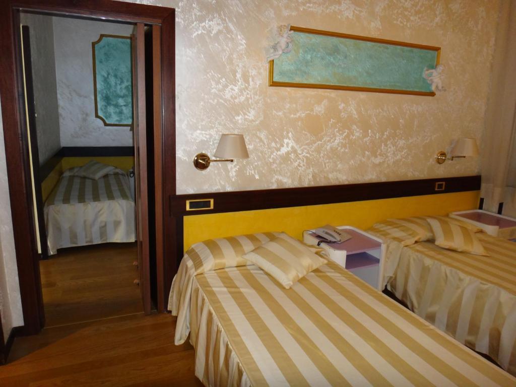 Benny Hotel กาตันซาโร ห้อง รูปภาพ